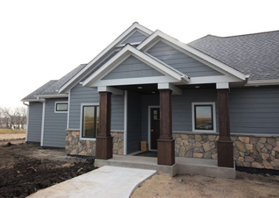 THERMATRU ENTRY DOOR, LP SIDING, MARVIN WINDOWS & BOULDER CREEK STONE