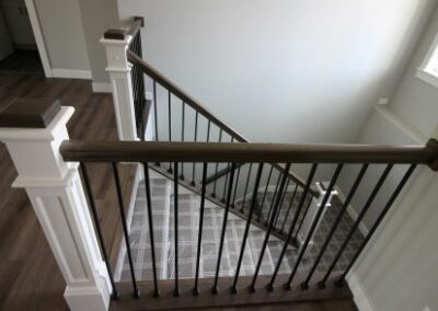 Interior Stairs Rubbed Copper Balusters with Poplar Rail